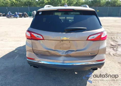 2018 Chevrolet Equinox Premier z USA, uszkodzony, nr VIN 2GNAXWEX9J6196335